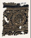 Textile fragment with ornate rosette, and tendrils with flower-heads