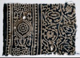 Textile fragment with vines and tendrils, a medallion, and rosettes