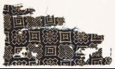 Textile fragment with squares, stepped squares, stars, and crosses