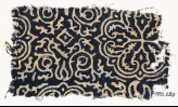 Textile fragment with floral quatrefoil, tendrils, and foliage