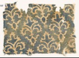 Textile fragment with stylized quatrefoil plants