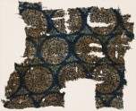 Textile fragment with peacocks and trees in roundels (EA1990.257)