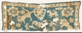 Textile fragment with animals, stars, and heart (EA1990.267)