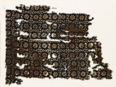 Textile fragment with S-shapes, rosettes, and flowers (EA1990.27)