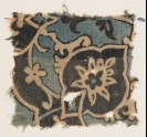 Textile fragment with large flower, tendrils, and leaves