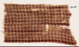 Textile fragment with linked squares