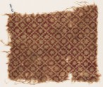 Textile fragment with stepped squares and rosettes