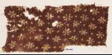 Textile fragment with rosettes