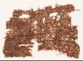 Textile fragment with interlocking floral shapes (EA1990.300)
