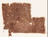Textile fragment with medallions, flowers, and tendrils