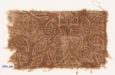 Textile fragment with stylized plants and quatrefoils