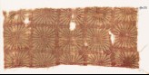 Textile fragment with large, square rosettes
