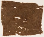 Textile fragment with circle, tendrils, and stylized plants