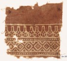 Textile fragment with linked diamond-shapes and stylized leaves (EA1990.349)