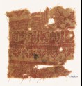 Textile fragment with arches and Arabic inscription