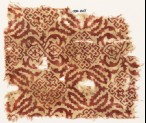 Textile fragment with squares, crosses, dots, and tendrils (EA1990.425)