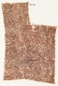 Textile fragment with stylized plants with oval flower-heads (EA1990.432)