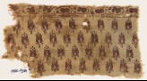Textile fragment with stylized flower-heads (EA1990.438)