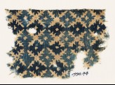 Textile fragment with serrated crosses