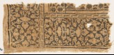 Textile fragment with floral patterns, leaves, and interlace (EA1990.454)