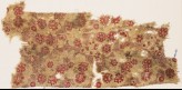 Textile fragment with rosettes and flower-heads