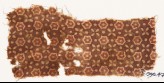 Textile fragment with stars, quatrefoils, and dots