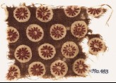 Textile fragment with rosettes in circles