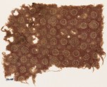 Textile fragment with rosettes, stars, dots, and crosses