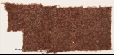 Textile fragment with rosettes, dots, and small squares (EA1990.487)