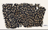 Textile fragment with swirling leaves (EA1990.50)