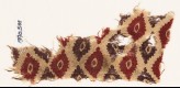 Textile fragment with indented ovals