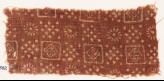Textile fragment with squares, clusters of dots, and rosettes