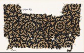 Textile fragment with swirling leaves and flowers