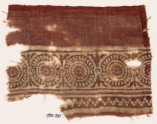 Textile fragment with rosettes in dotted frames (EA1990.521)