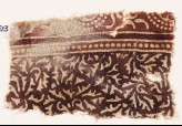 Textile fragment with swirling leaves and tendrils (EA1990.523)