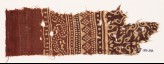 Textile fragment with bands of dotted patterns, vine, and stylized leaves (EA1990.536)