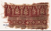 Textile fragment with columns, stylized trees, diamond-shapes, and leaves