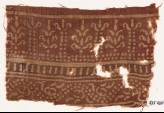 Textile fragment with bands of columns and stylized trees, and a dotted vine (EA1990.553)