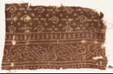 Textile fragment with spirals and dotted vine