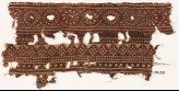 Textile fragment with bands of rosettes and dotted rhombic shapes