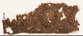 Textile fragment with star-shaped flowers in dotted circles (EA1990.565)