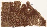 Textile fragment with rosettes in dotted circles, flower-heads, and dotted tendrils (EA1990.567)