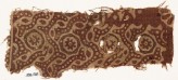 Textile fragment with dotted tendrils and small rosettes in circles