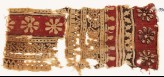 Textile fragment with bands of rosettes and vines (EA1990.583)