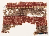 Textile fragment with stars, squares, and fans (EA1990.593)
