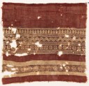 Textile fragment with bands of rosettes, zigzag, and possibly vases (EA1990.600)