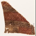 Textile fragment with bands of stylized plants, rosettes, and tendrils