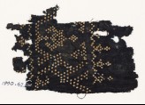Textile fragment with dots arranged as a band, possibly with a vase shape