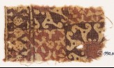 Textile fragment with squares, spirals, and possibly tendrils
