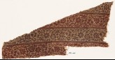 Textile fragment with vines, leaves, and flowers, probably from a garment